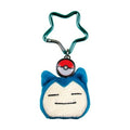 Blue Snorlax plush key holder featuring retractable reel and star carabiner