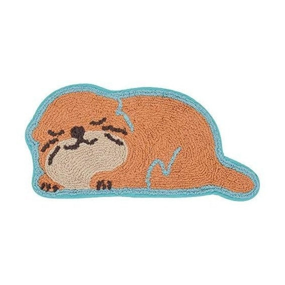 Orange sleeping otter rug with closed eyes and paw prints textured loop pile fabric