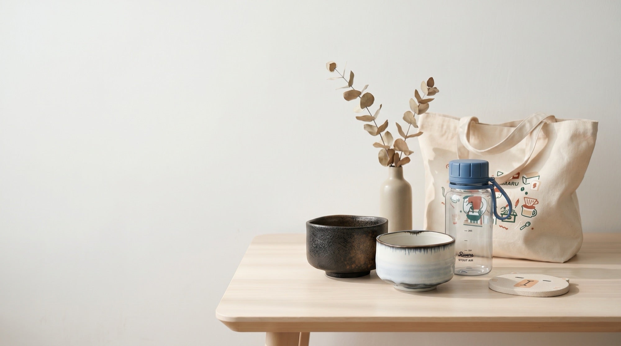 Minimaru kitchen and table homeware styled on a calm surface